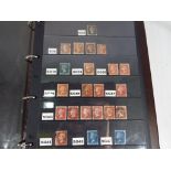 A very good collection of UK Victorian and later postage stamps mounted in an album,