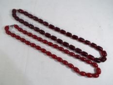 Two amber style Bakelite beaded necklaces, one 63 cm and the other 58 cm, size of beads 1.