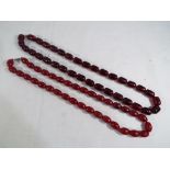 Two amber style Bakelite beaded necklaces, one 63 cm and the other 58 cm, size of beads 1.