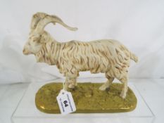 Royal Dux - a figurine depicting a mountain goat,