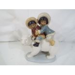 Lladro - A Lladro figurine # 2270 Eskimo Riders in gres finish,