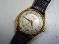 A gentlemans automatic wristwatch, 21 jewel movement, gold plated case,