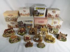 Twelve predominantly miniature models of cottages to include Lilliput Lane, David Winter Cottages,