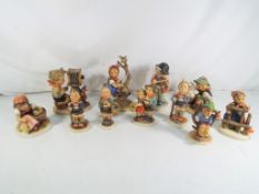 Eleven Goebel Hummel figurines depicting children (qty) This lot MUST be paid for and collected,