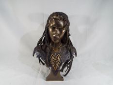 A resin bust from the Poussiere De Bronze Collection by Idyllis issued in a limited edition 330 /