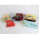 Five vintage children's sewing machines to include Vulcan,