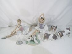 Two Nao figurines depicting ballerinas, a Nao group of geese,