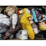 A good mixed lot to include a collection of dressed dolls to include porcelain, Fisher Price,