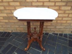 A good quality oak framed highly carved marble top occasional table/wash stand,