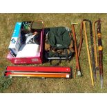 A mixed lot to include six wooden walking sticks, a tin containing a quantity of toy soldiers,