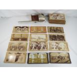 A stereoscope viewer by H C White with approx 50 cards to include Underwood and Underwood,