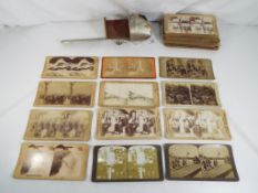 A stereoscope viewer by H C White with approx 50 cards to include Underwood and Underwood,