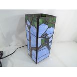 A Tiffany style cuboid lamp depicting birds, approximate height 28 cm.