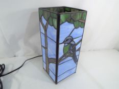 A Tiffany style cuboid lamp depicting birds, approximate height 28 cm.
