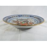 A very large Asian footed bowl, floral decoration to the rim,