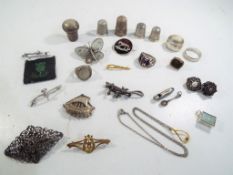 A collection of predominantly silver jewellery to include lady's and gentleman's rings, brooches,