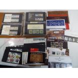 Philately - a Royal Mail presentation packs binder containing a quantity of mint stamps and a