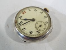 A silver cased watch with ceramic fascia stamped 0925.