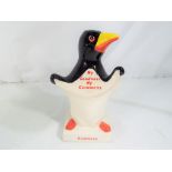 Carlton Ware - a Carlton Ware Guinness penguin lamp base, approximate height 18 cm (h).