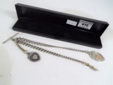 A silver handled double Albert and fob watch chain approximate weight 52 grams, boxed.