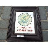 A framed advertising mirror for Player's Navy Cut Tobacco and Cigarettes,