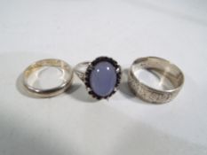 Three silver dress rings. Estimate £20 -