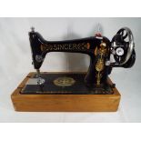 A decorative vintage Singer Sewing Machi