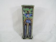 Doulton Lambeth - an art nouveau moulded stone ware square section vase by Francis Pope decorated
