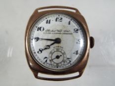 A 9ct gold cased wrist watch Arabic numerals to the dial, marked Herbert Wolf Ltd London, Liverpool,