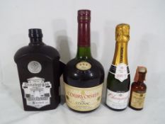 A bottle of Courvoisier, 3 Star Luxe cognac 40% ABV 680ml, high shoulder level,