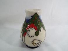 Moorcroft - a Moorcroft vase decorated in the Three French Hens pattern,
