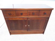A heavy contemporary four drawer two door sideboard approx 96cm x 120cm x 50cm (see also lot 111B)