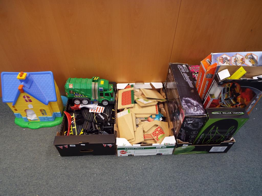 A good mixed lot of toys to include a Chad Valley racing car game,