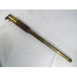 A brass and leather clad 3 draw telescope,