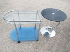 A retro glass drinks trolley and a glass topped occasional table [2] This lot MUST be paid for and