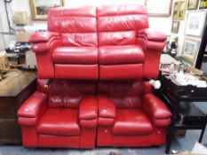 A good red leather reclining sofa with matching armchair [2] This lot MUST be paid for and