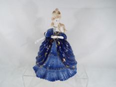 Coalport - a figurine entitled Moon from The Millennium Ball series issued in a limited edition of