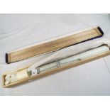 A Japanese calligraphy scroll in original box,