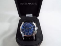 A gentleman's Emporio Armani wristwatch with leather strap and presentation case.