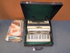 A cased Italian Geraldo standard accordion 80-2 and quantity of sheet music This lot MUST be paid
