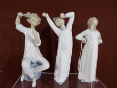 Three good quality ceramic Lladro figurines.
