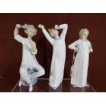 Three good quality ceramic Lladro figurines.