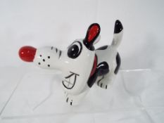 Lorna Bailey - a comical figurine depicting a dog, signed to the underside, 10.