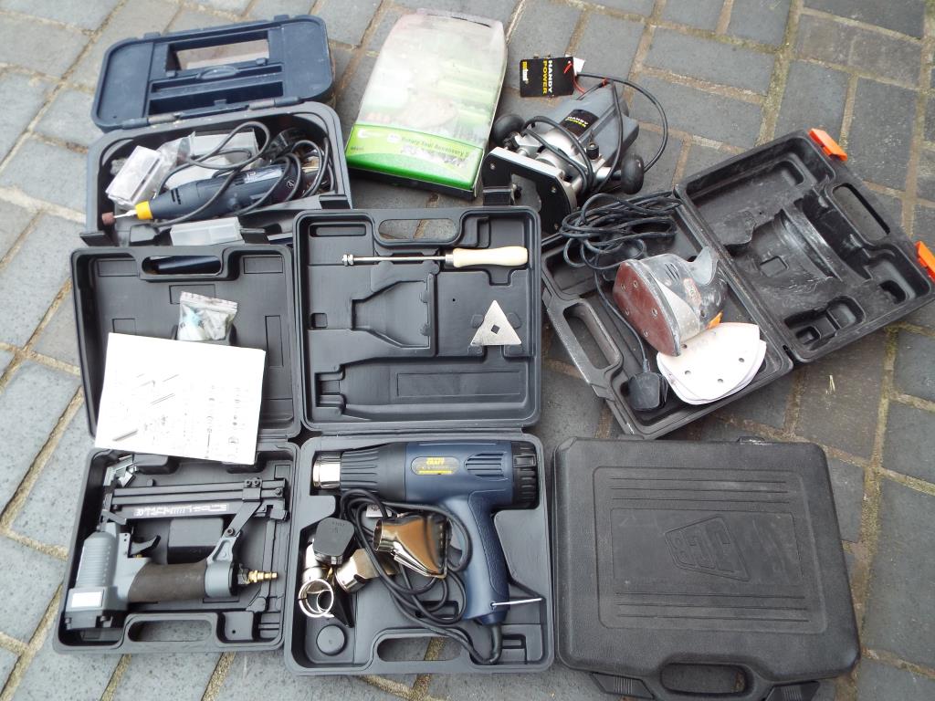 A mixed lot of boxed and unboxed DIY tools to include a JCB stapler, a Nu Tool quarter inch router,