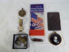 A good mixed lot to include a white metal engine turned cigarette case, a yellow metal pocket watch,