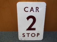 Railwayana - a railway stopping marker enamel sign reading Car 2 Stop, 46cm x 3.