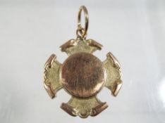 A 9ct gold hallmarked fob approx .7.32g total weight.