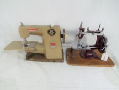 A Vulcan Countess 1960's vintage child's sewing machine and a further child's vintage sewing