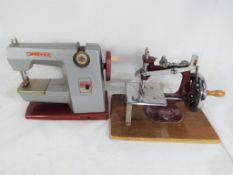 A Vulcan Classic 1960's vintage child's sewing machine and a further child's vintage sewing machine