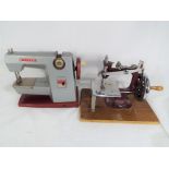 A Vulcan Classic 1960's vintage child's sewing machine and a further child's vintage sewing machine